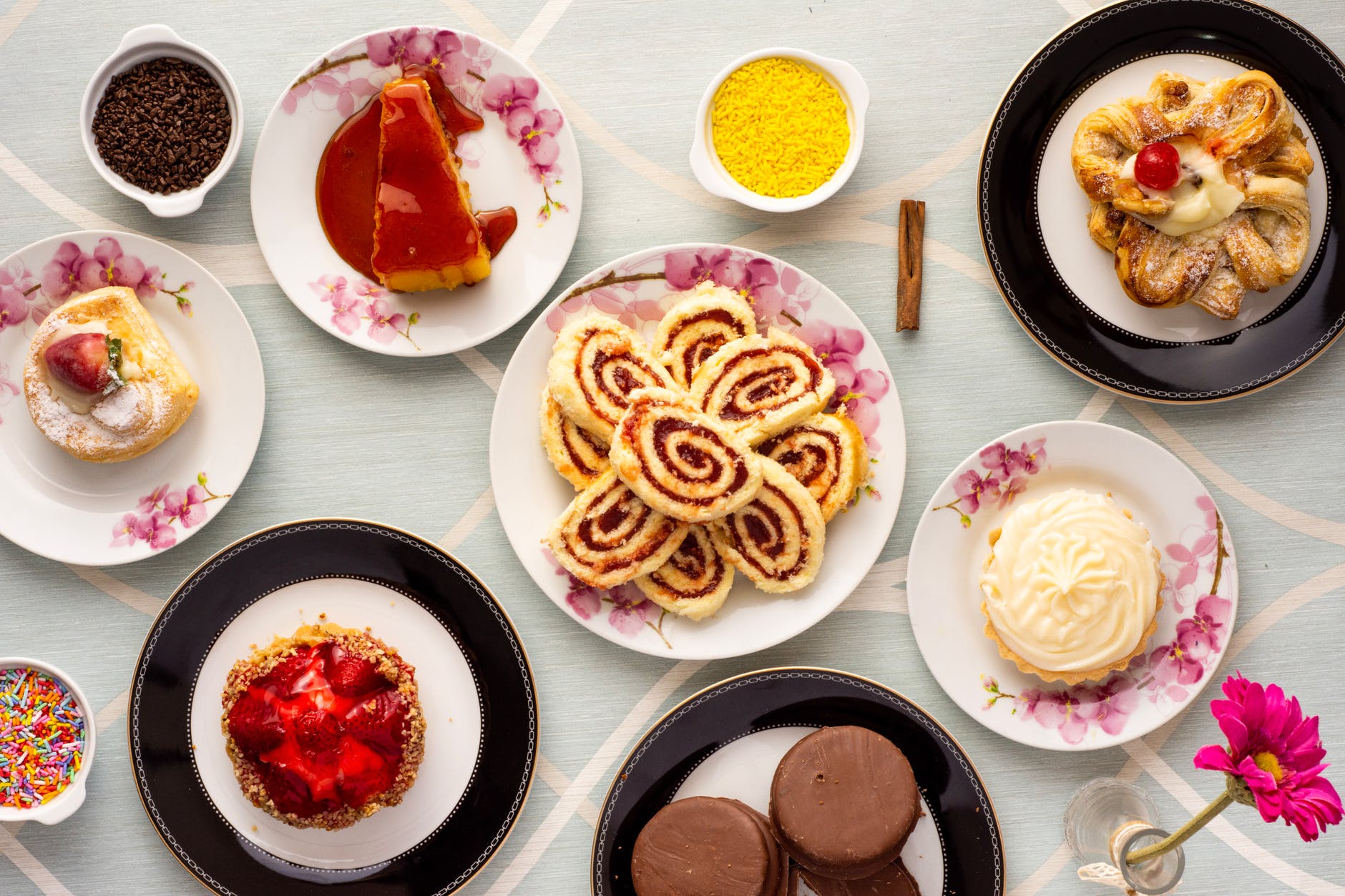 variety of baked and dessert foods on plates